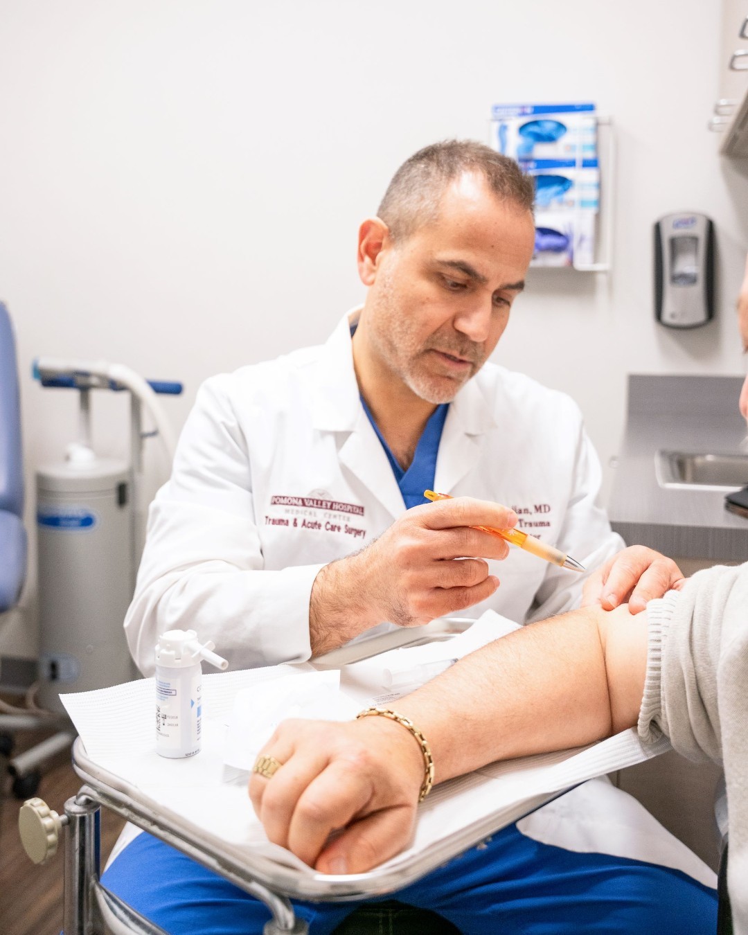 Dr. Hrayr Basmajian consulting with a patient at Pomona Valley Hospital